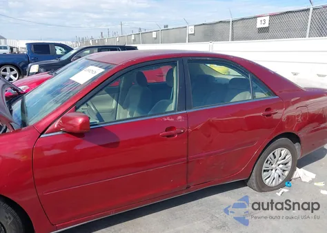 2003 Toyota Camry Le z USA, uszkodzony, nr VIN JTDBE32K430171722